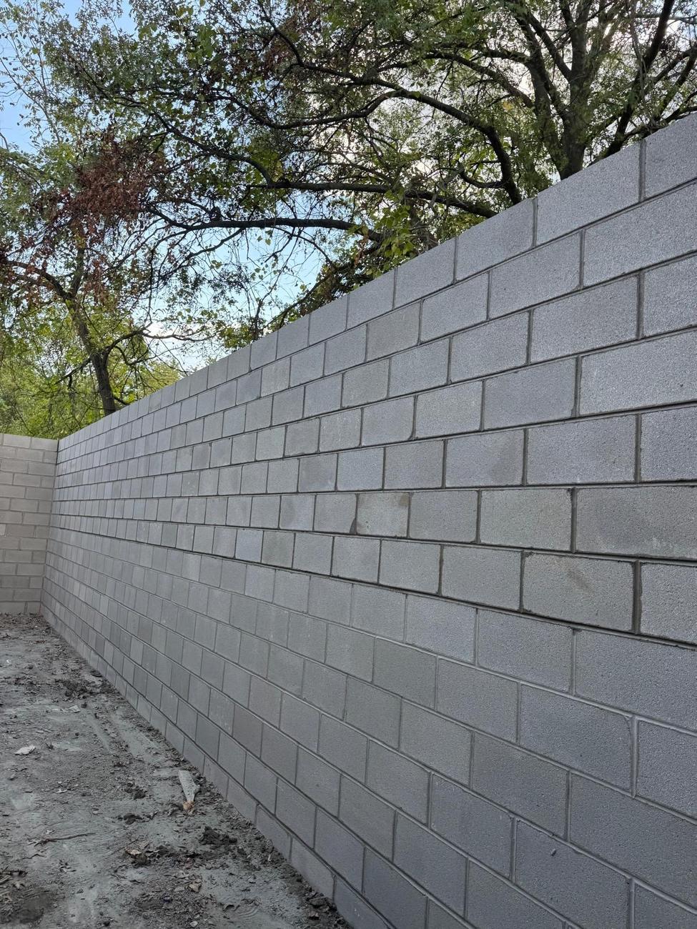 Long concrete block wall