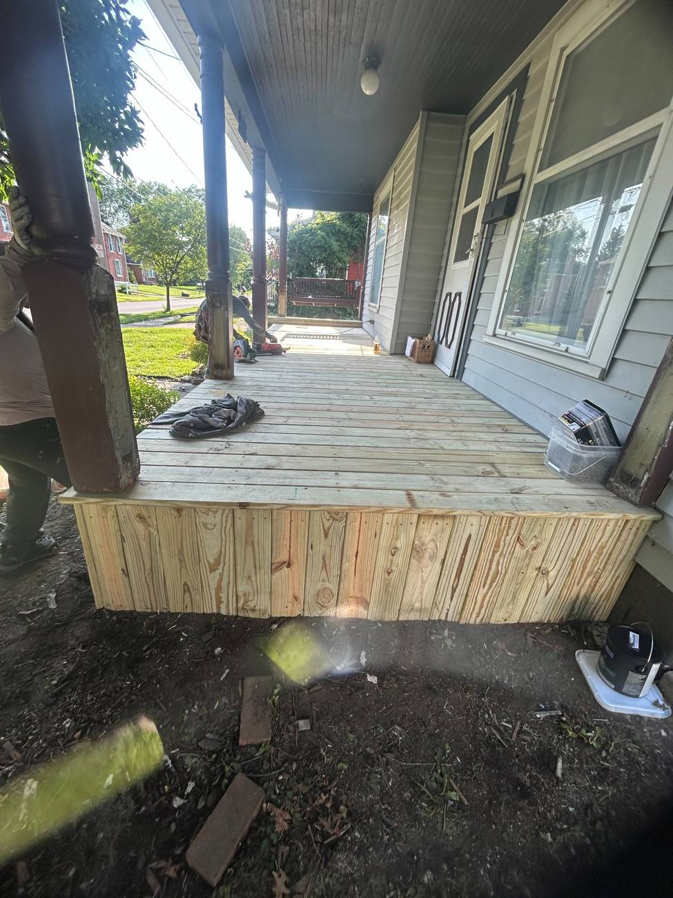 Front porch rebuilt with new decking and skirting